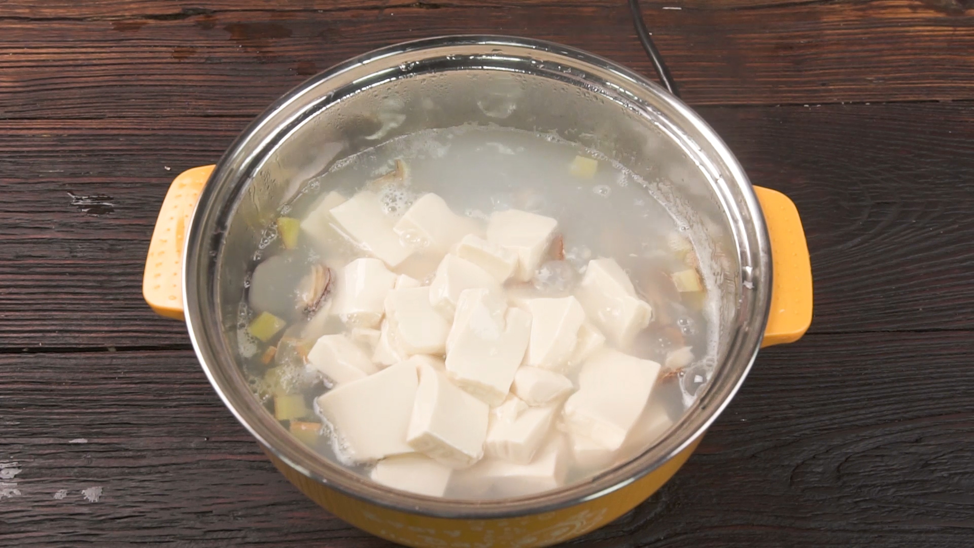 花蛤豆腐汤做法步骤：6